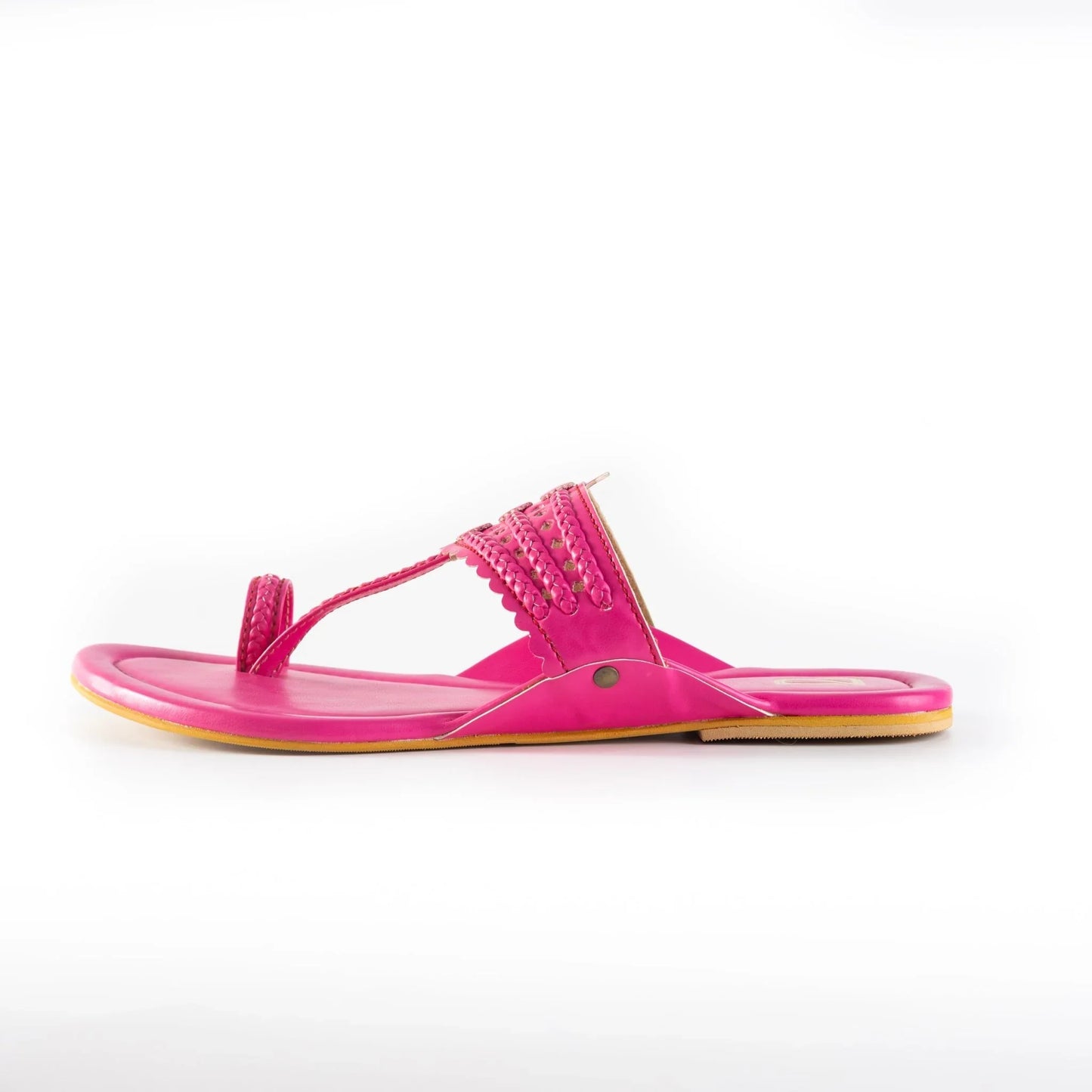Bright pink handcrafted women's jutti sandal with intricate braided design on white background