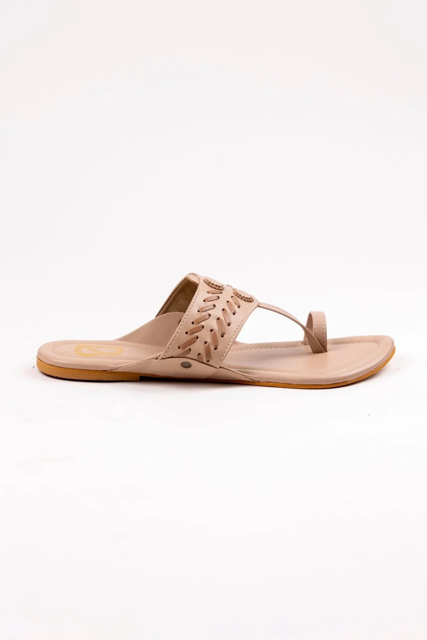 Beige leather women's jutti sandal with cutout detailing and toe loop, flat sole, stylish design