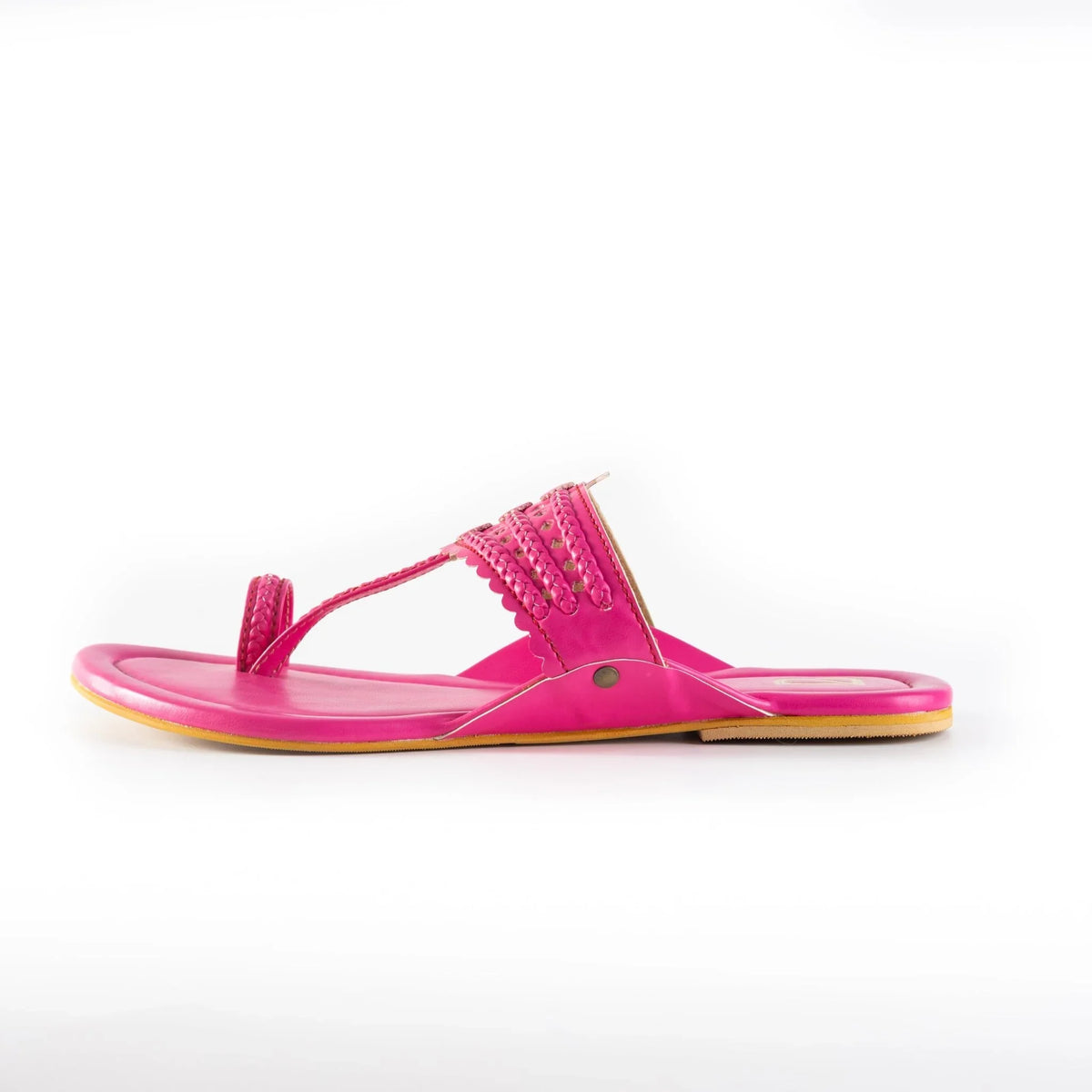 Bright pink handcrafted women's jutti sandal with intricate braided design on white background