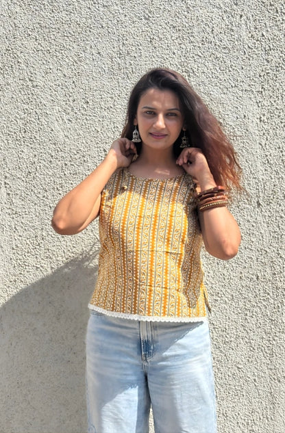 A vibrant Rani necklace with intricate gold work and colorful gemstones.